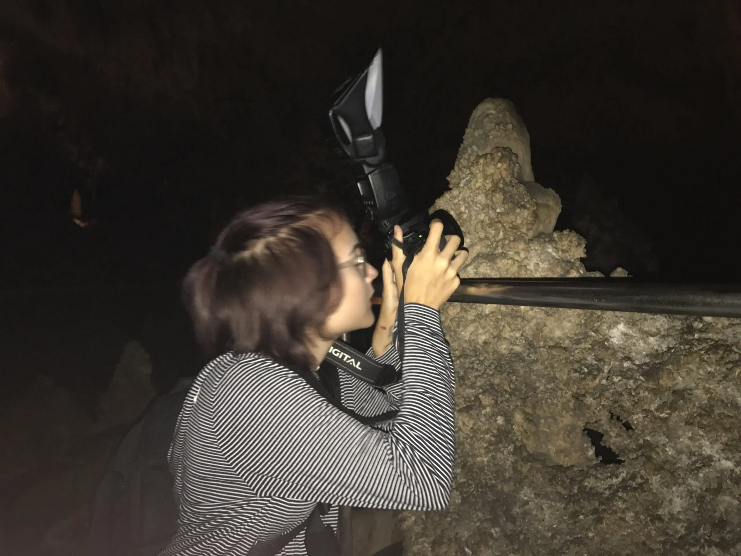 My teen trying her chance at carlsbad caverns cave photography