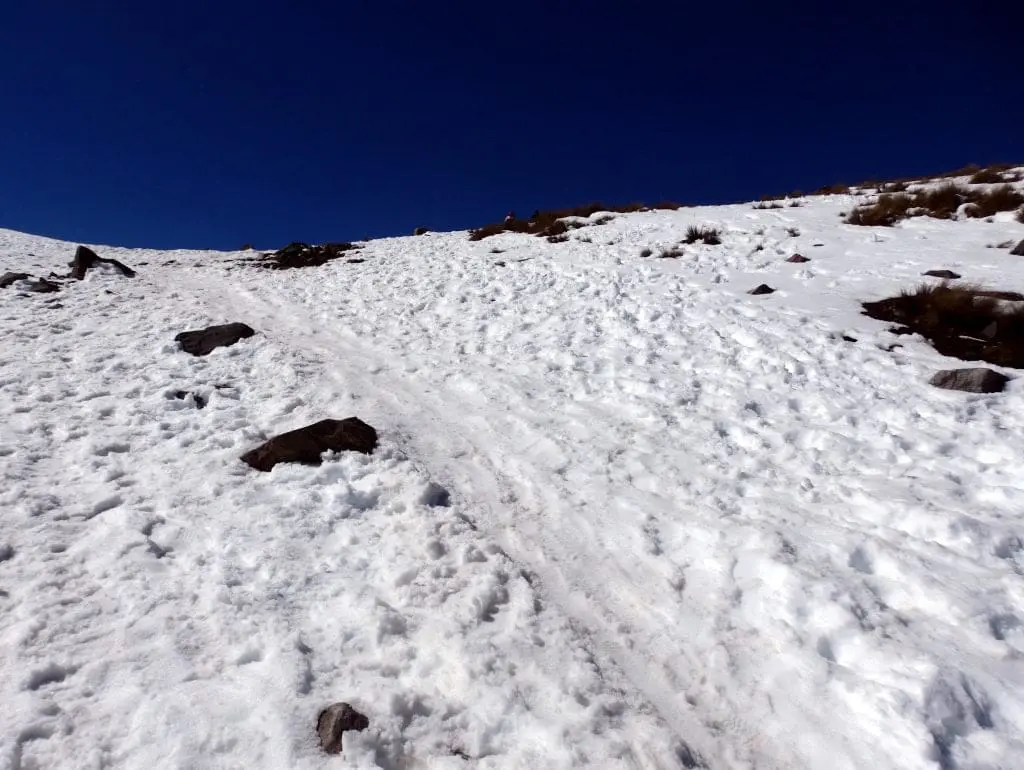 Nevado de Toluca climb up snow covered track.