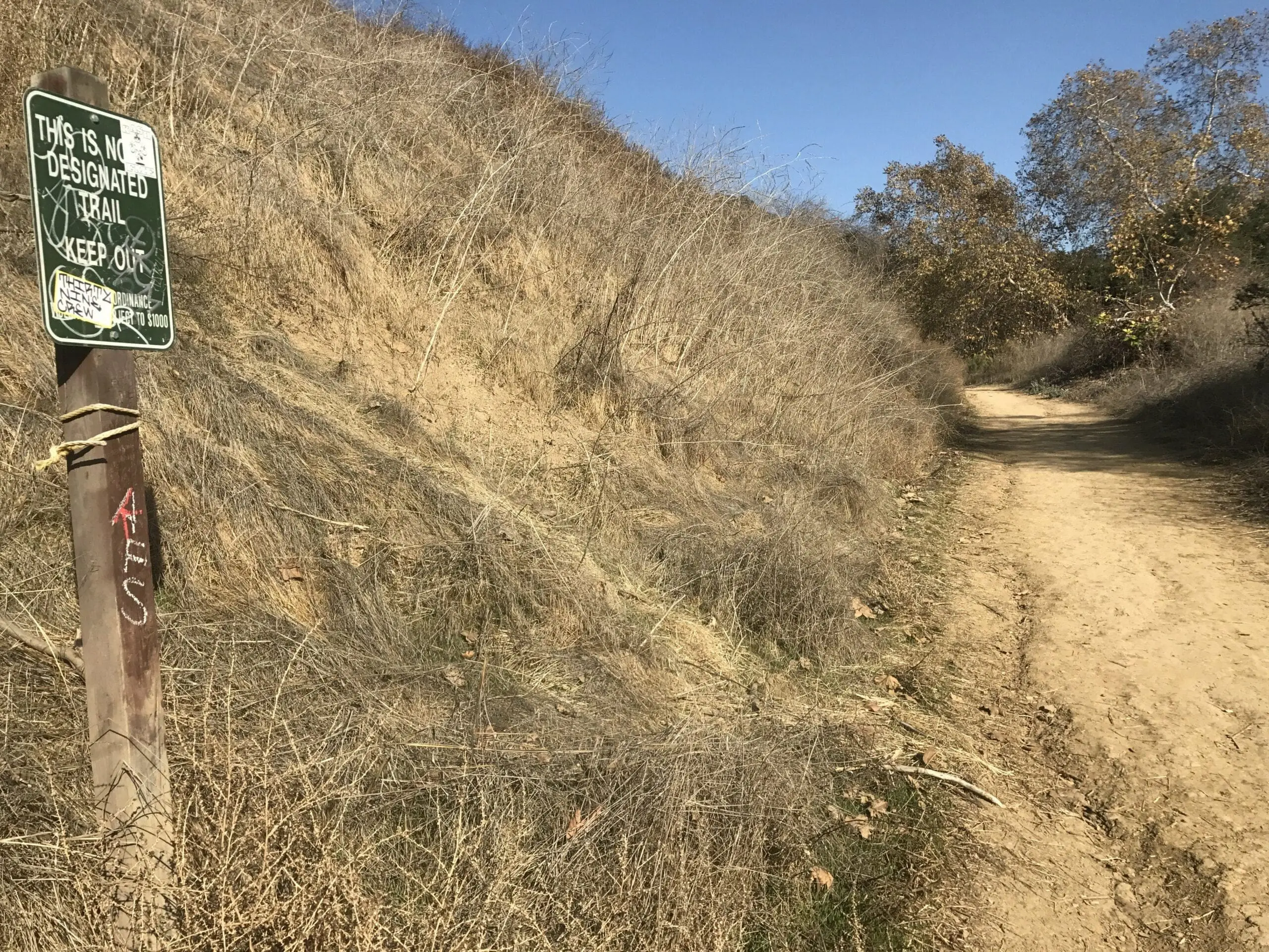 Turnbull Canyon Trail marker, keep on main trail sign