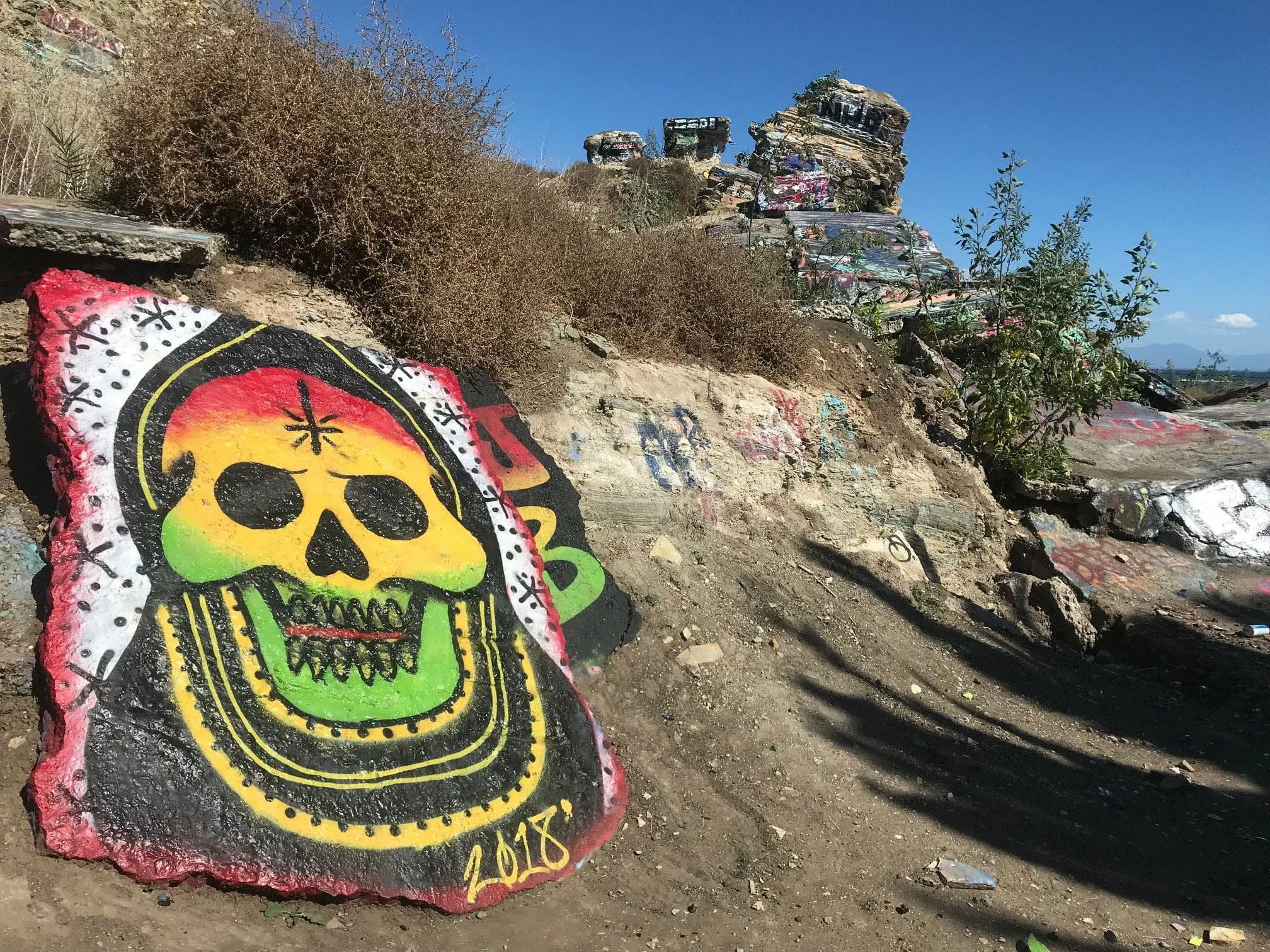 san pedro sunken city graffiti rasta style skull 