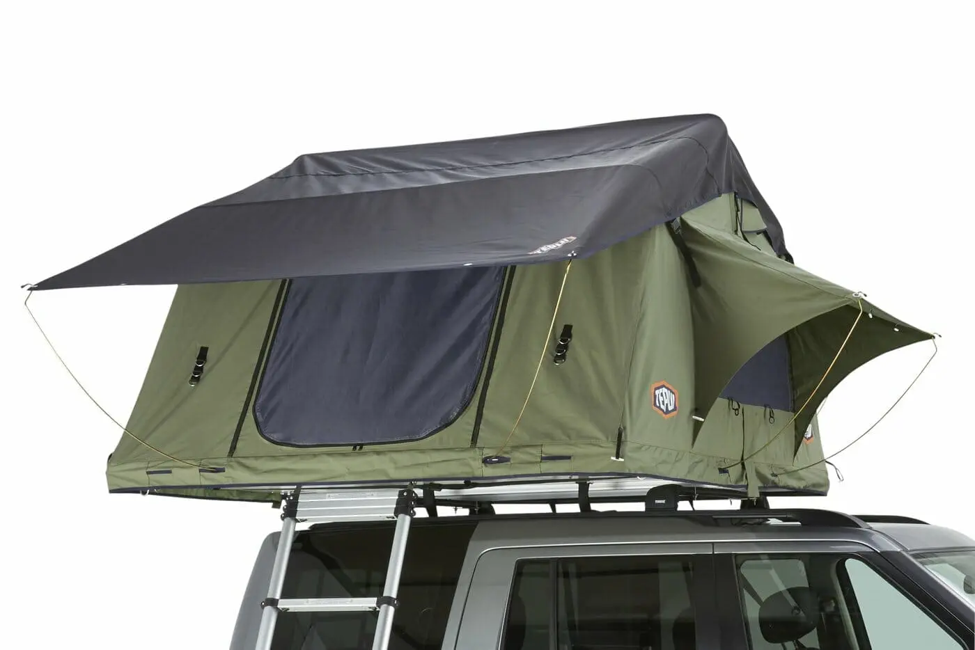 Softshell rooftop tent mounted on vehicle