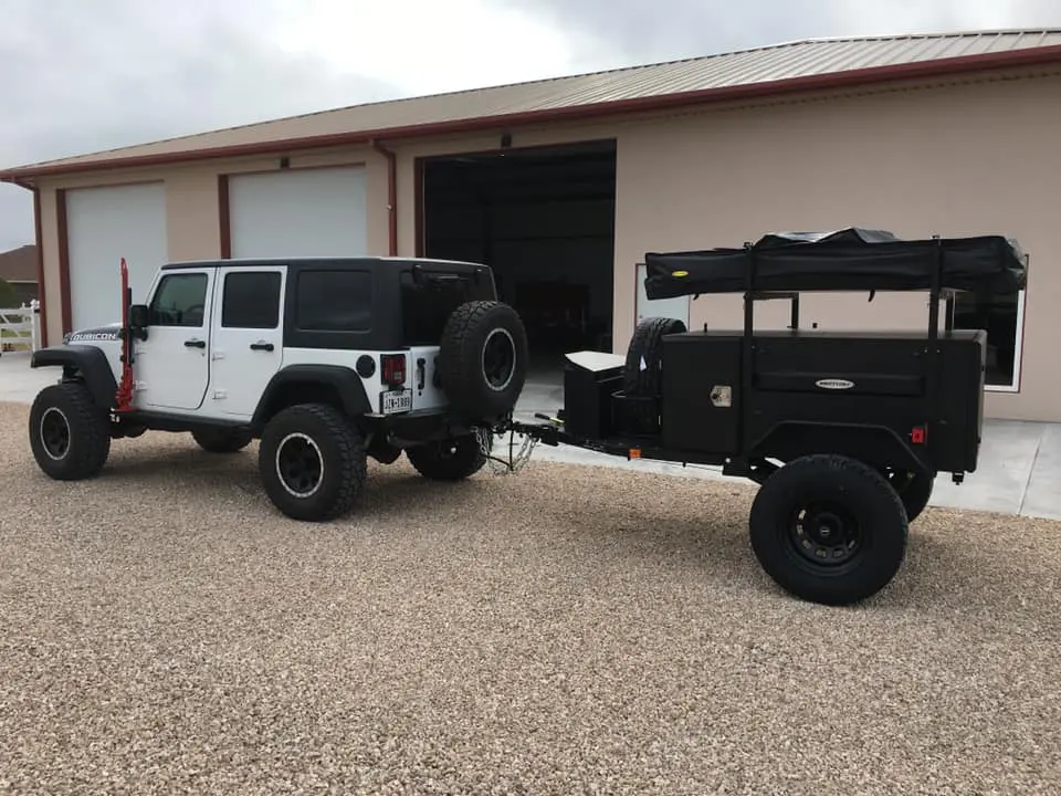 Rooftop tent mounted on trailer Jeep Wrangler